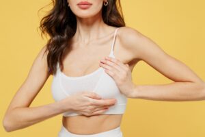 A cropped shot of a woman's chest after a breast lift in Phoenix